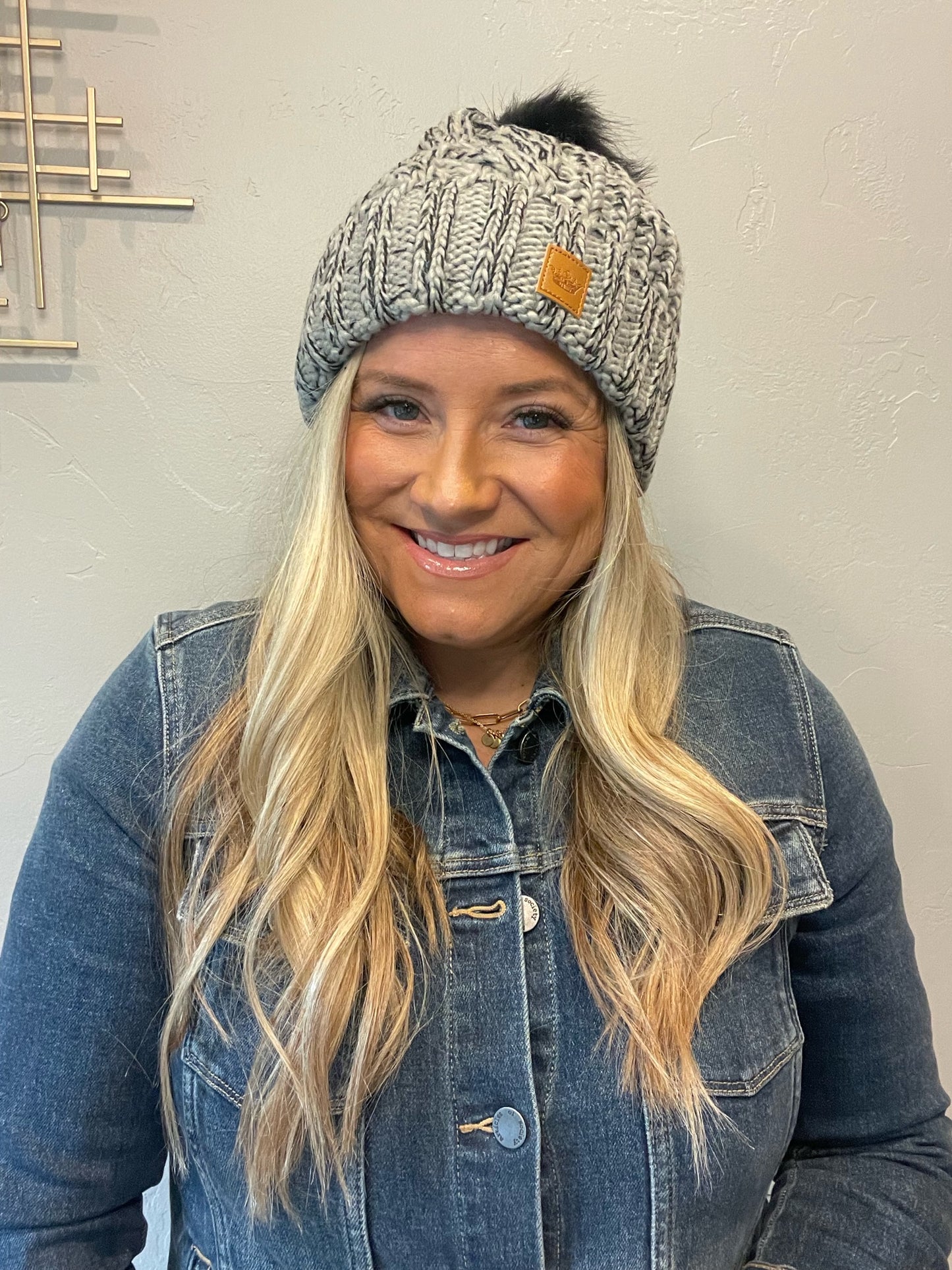 Adorable fleece lined grey & black cable knit beanie with pom accent