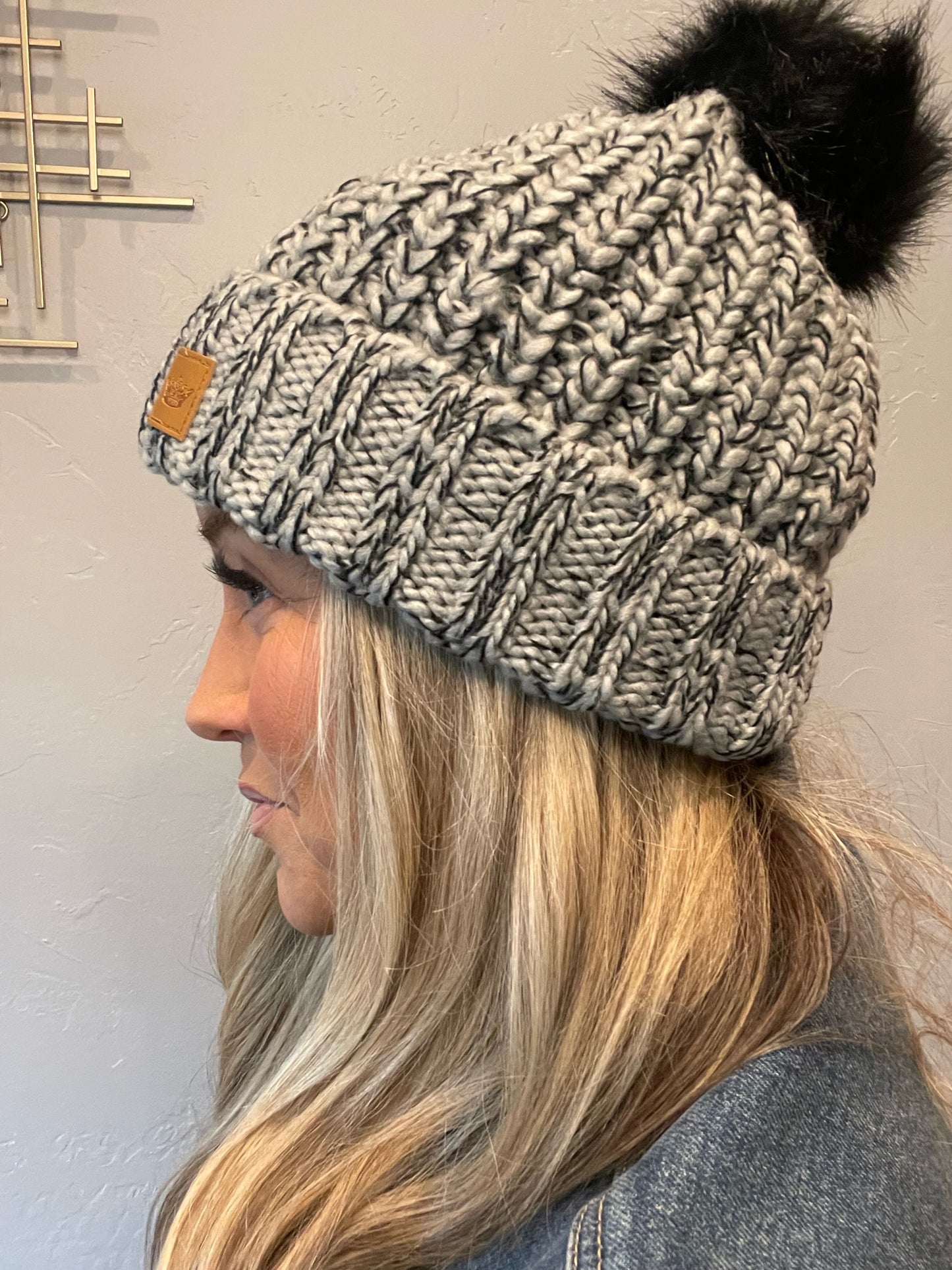 Adorable fleece lined grey & black cable knit beanie with pom accent