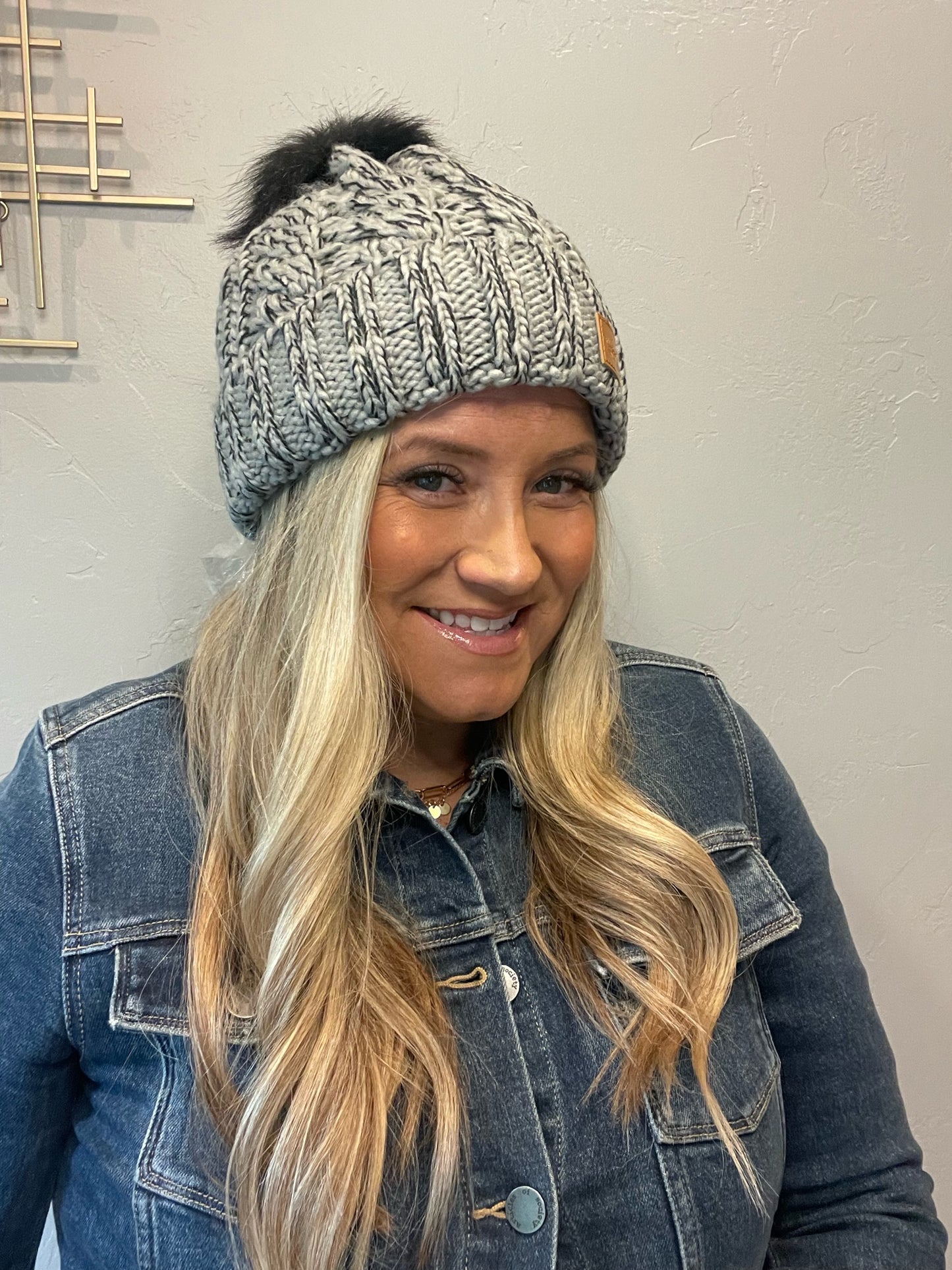 Adorable fleece lined grey & black cable knit beanie with pom accent