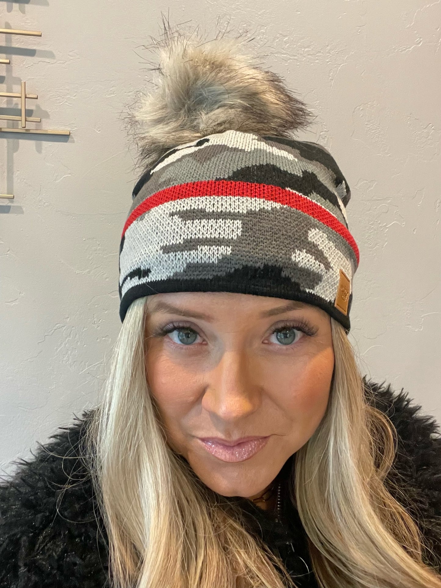 Adorable fleece lined gray camouflage knit pom beanie with red stripe