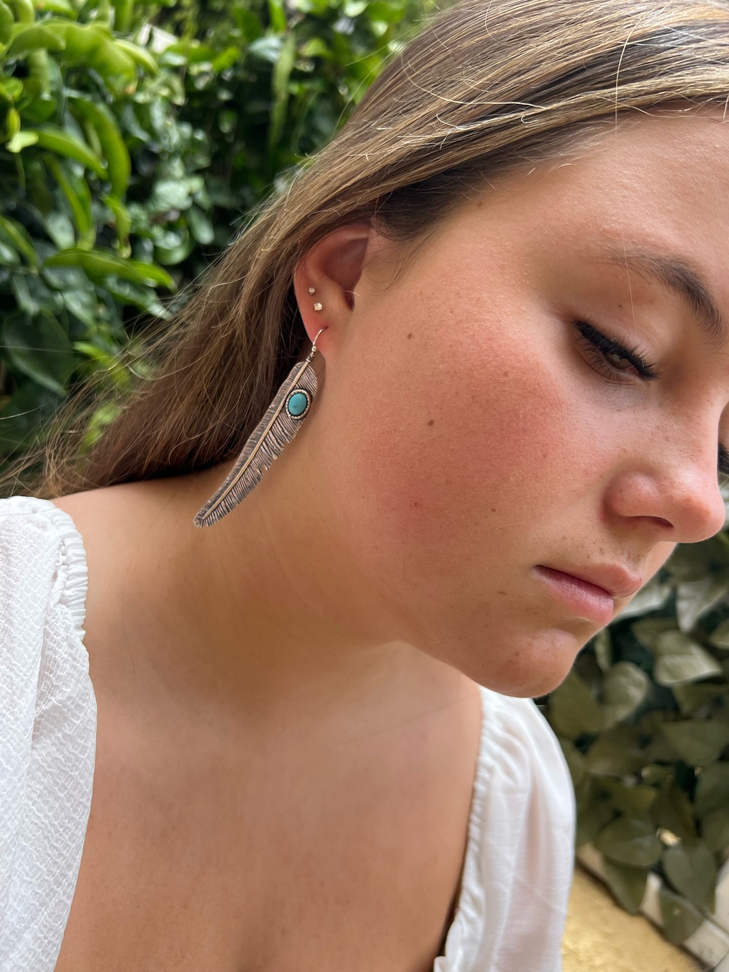 Dangling Feather Earrings with Turquoise Stone Accent