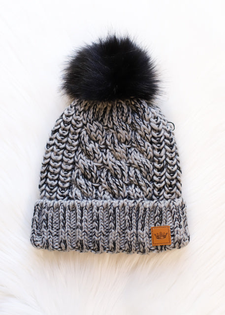 Adorable fleece lined grey & black cable knit beanie with pom accent